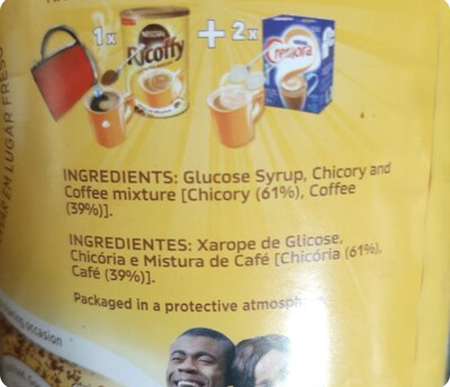 Close-up of a Ricoffy ingredients panel reading: "Glucose Syrup, Chicory and Coffee mixture [Chicory (61%), Coffee (39%)]."