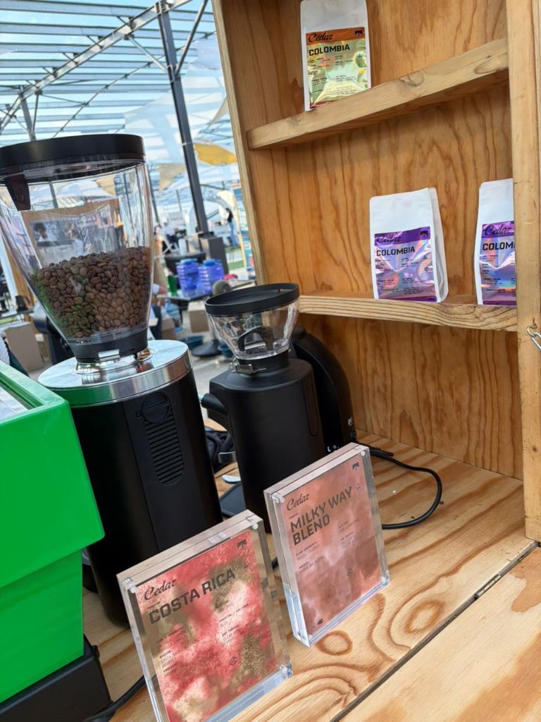 Cedar Coffee espresso grinders with information cards for Costa Rica and Milky Way Blend